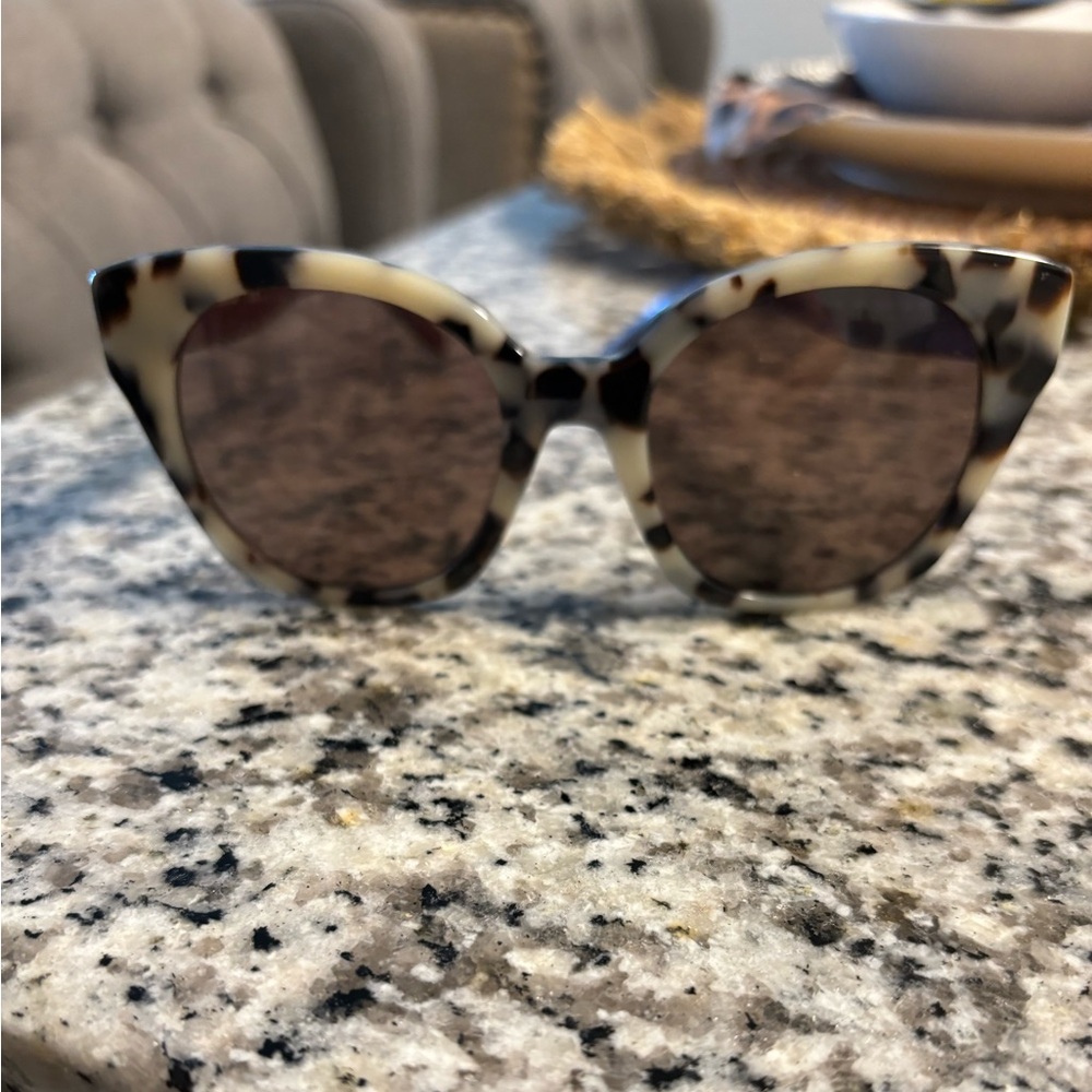 Tory Burch Tortoise sunglasses with maroon arms